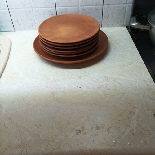 Handmade terracotta ceramics like new with holes for hanging