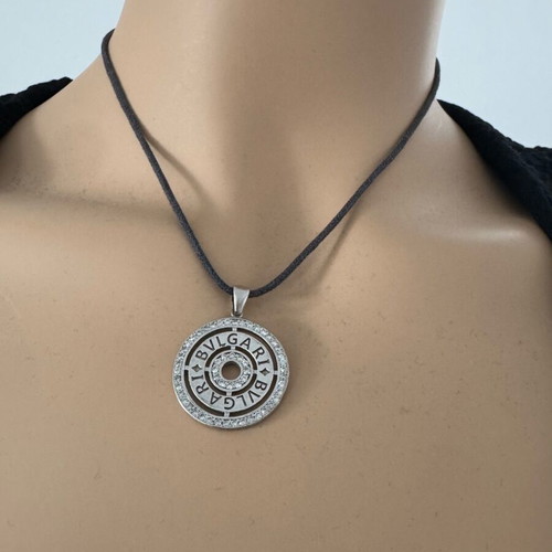 Bvlgari necklace with leather cord gray like new