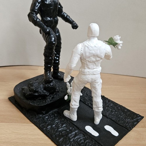 Handmade memorial statue with soldier figure