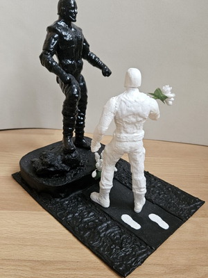 Handmade memorial statue with soldier figure