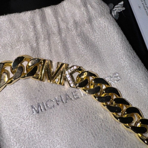 Michael Kors necklace new, gold plated with zircon
