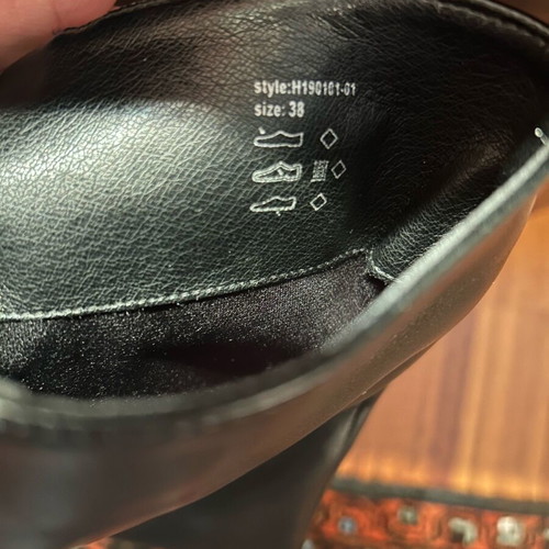 Black high boots made of smooth synthetic leather like new, size 38