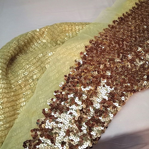 Stable fabric with gold sequins used