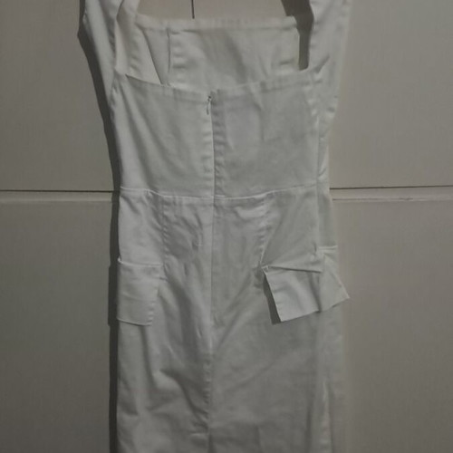 White tight dress Lipsy London used, fake pockets, open back