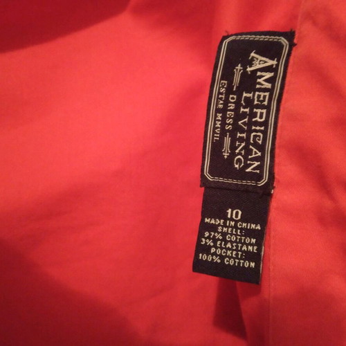 Dress with pleats and buttons used, size M