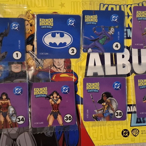 Koukouroukou DC sticker album with 12 sealed stickers