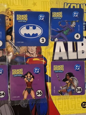 Koukouroukou DC sticker album with 12 sealed stickers