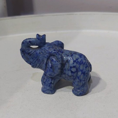Decorative elephant carved from natural blue stone like new