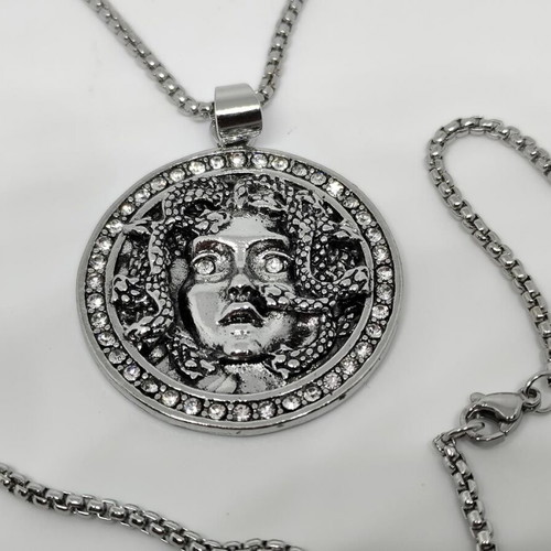 Medusa Pendant in Steel like new with rhinestones and chain