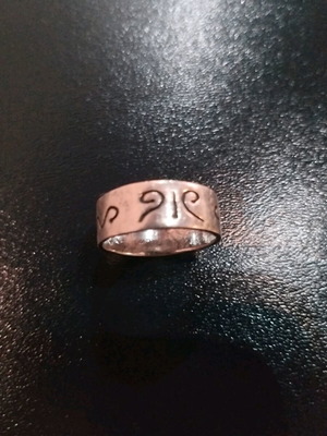 silver ring with designs
