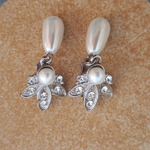 Vintage earrings with clips used, decorated with pearls and rhinestones