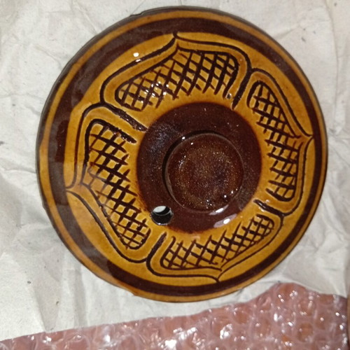 Traditional ceramic clay pot with lid and side handles