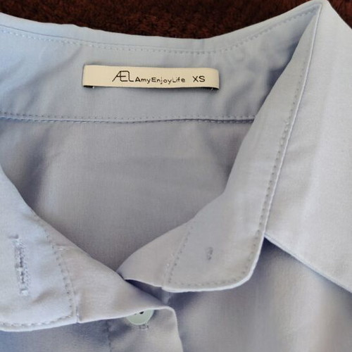Blue shirt with corset detail, like new, size XS