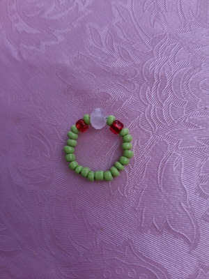 Elastic ring with decorative beads