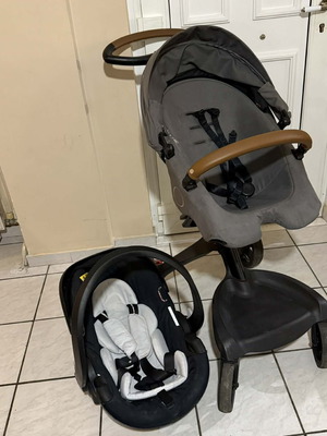 Stokke stroller used with footmuff and baby carrier