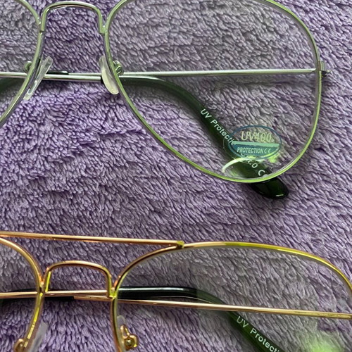 Glasses with clear lenses new, silver and gold frame