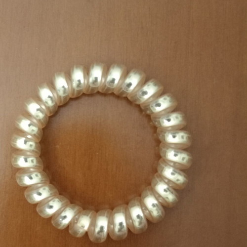 Spiral Hair Tie like new, shiny gold color