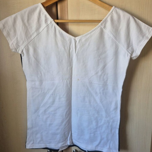 White Bette blouse with black design and rhinestones used, size M