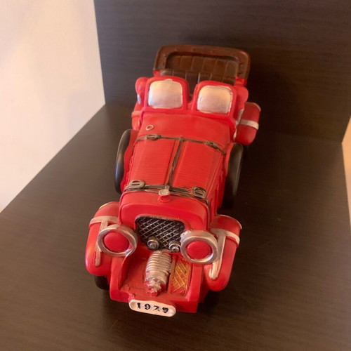 Vintage car in red color like new