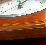  Ρολόι επιτοίχιο με μασίφ ξύλινη κορνίζα και inox στεφάνι ... Διάμετρος 28 cm... Αμεταχείριστο λειτουργεί άψογα!