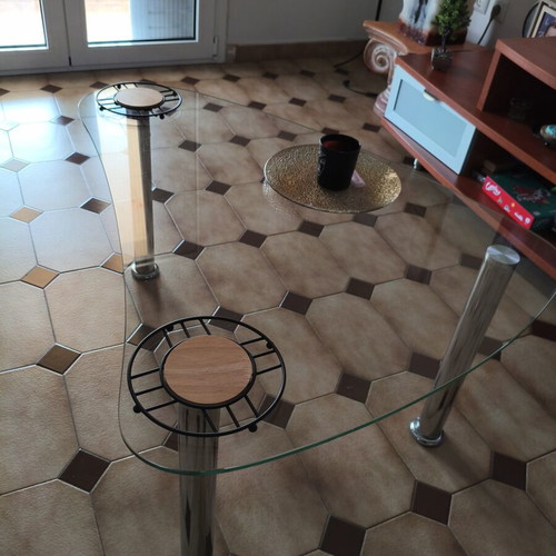 Glass coffee table with metal legs