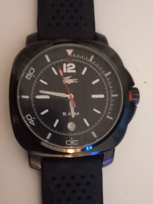 Lacoste watch used with black rubber strap