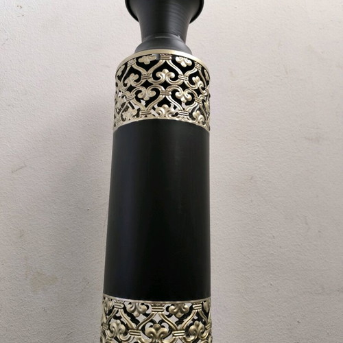 Metal vase in black color with bronze designs like new