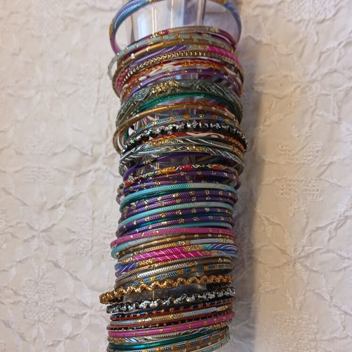 Indian glass bracelets like new, set of 54, colorful and decorated