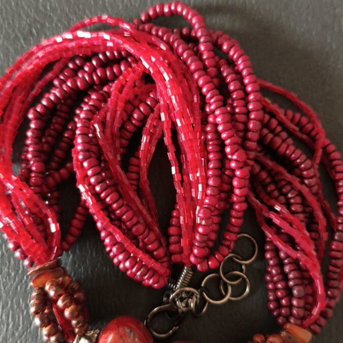 Necklace like new, handmade multistrand with red beads and marble-like stones