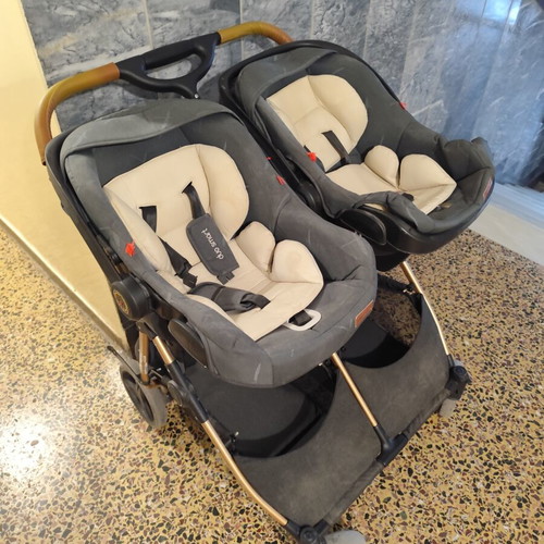 Chipolino twin stroller with baskets and car seat adapters used