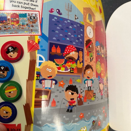 Children's activity book with puzzles and stickers in English like new