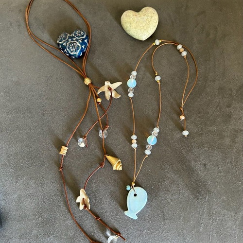 Fish necklace of very good quality and gift Necklace with leather decorations