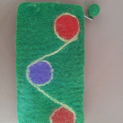 Wool pencil case and sharpener like new, pack