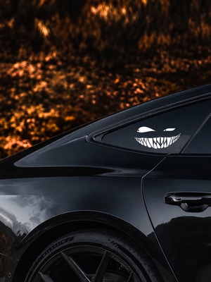 Car sticker with scary smile and eyes, white
