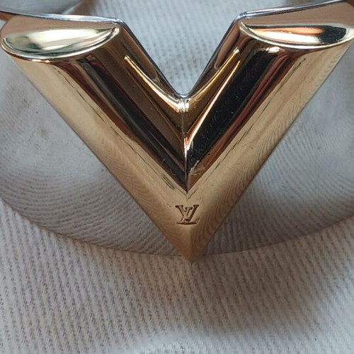 Louis Vuitton metal bracelet like new, gold and silver
