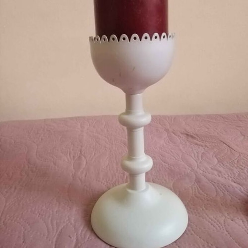 Set of two white metal candlesticks with candle like new
