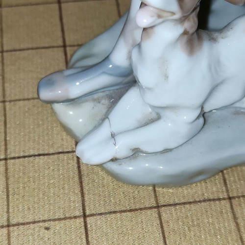 Lladró Boy with Dog porcelain figure refurbished
