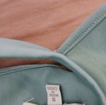 Sleeveless dress like new with impressive back in silver pistachio color