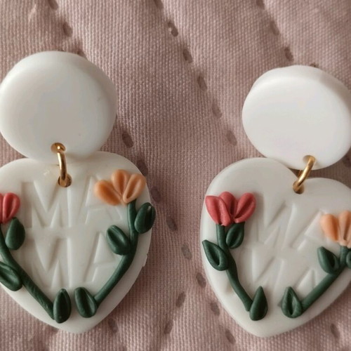 Heart-shaped earrings like new, plastic white and pink with flowers