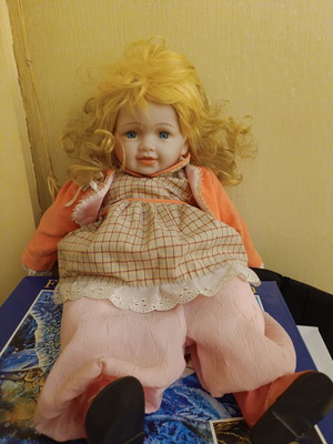 Large baby doll with voice mechanism used, blonde hair and blue eyes
