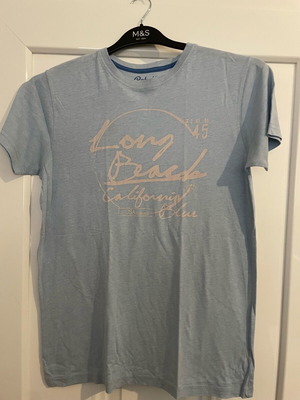 T-shirt Rebel by Primark Long Beach μεταχειρισμένο, τιρκουάζ, για 12-13 ετών