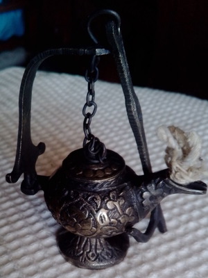 Small traditional bronze oil lamp