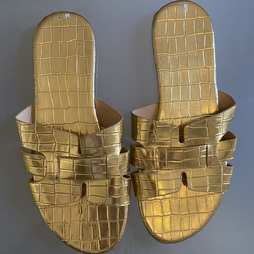 Gold Sandals like new, unique design, size 39