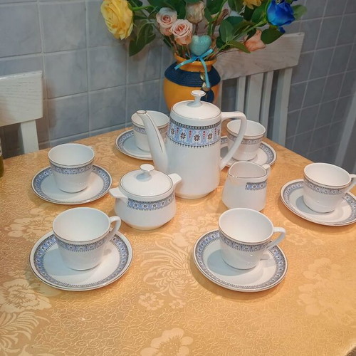 Chinese porcelain tea set like new with gold accents