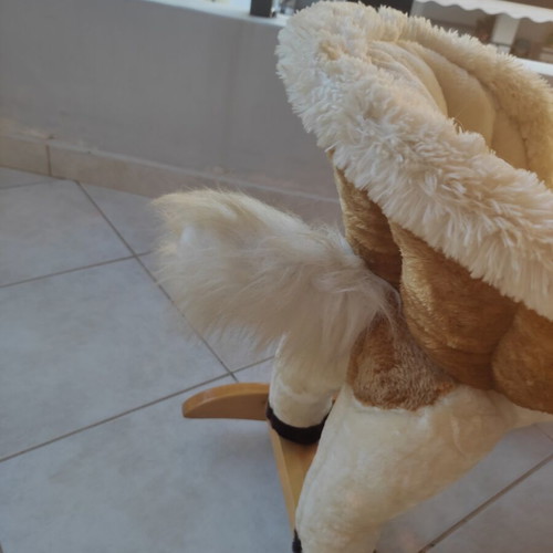 Wooden rocking horse like new with plush carriage