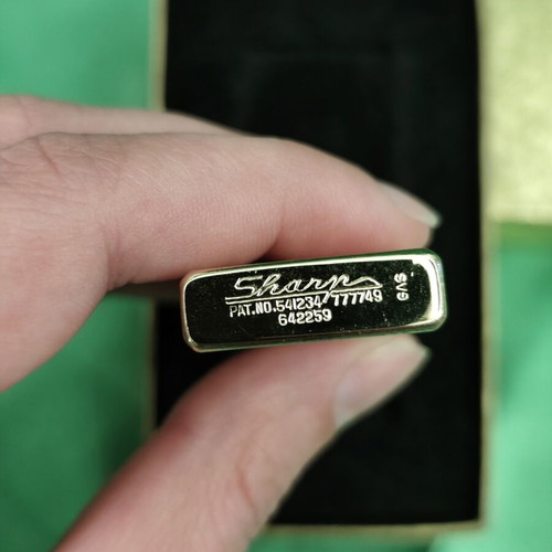 Sharp gas lighter used, gold plated with original box