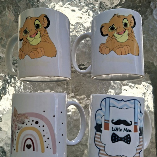 Ceramic mugs like new, pack of 4 with various designs