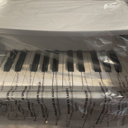Children's Piano like new, wooden, battery operated