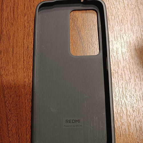 Redmi Silicone Case used, dimensions 17x8 cm