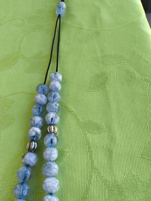 Worry beads like new with white and light blue beads